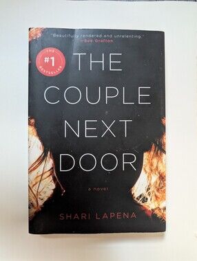 The Couple Next Door By Shari Lapena—  Paperback Book